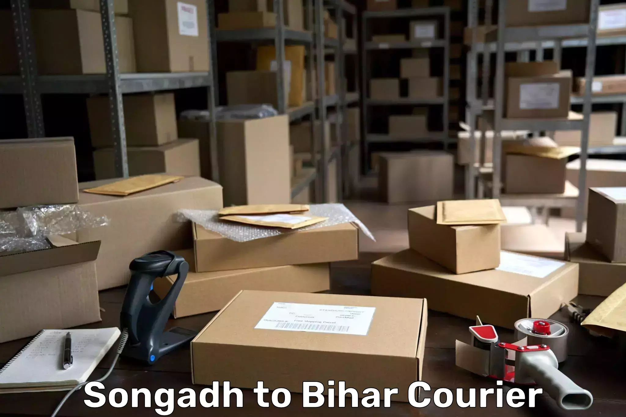 Courier service partnerships Songadh to Kochas