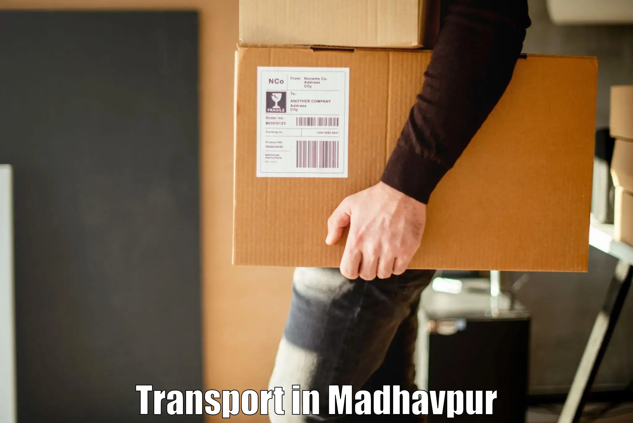 Two wheeler parcel service in Madhavpur